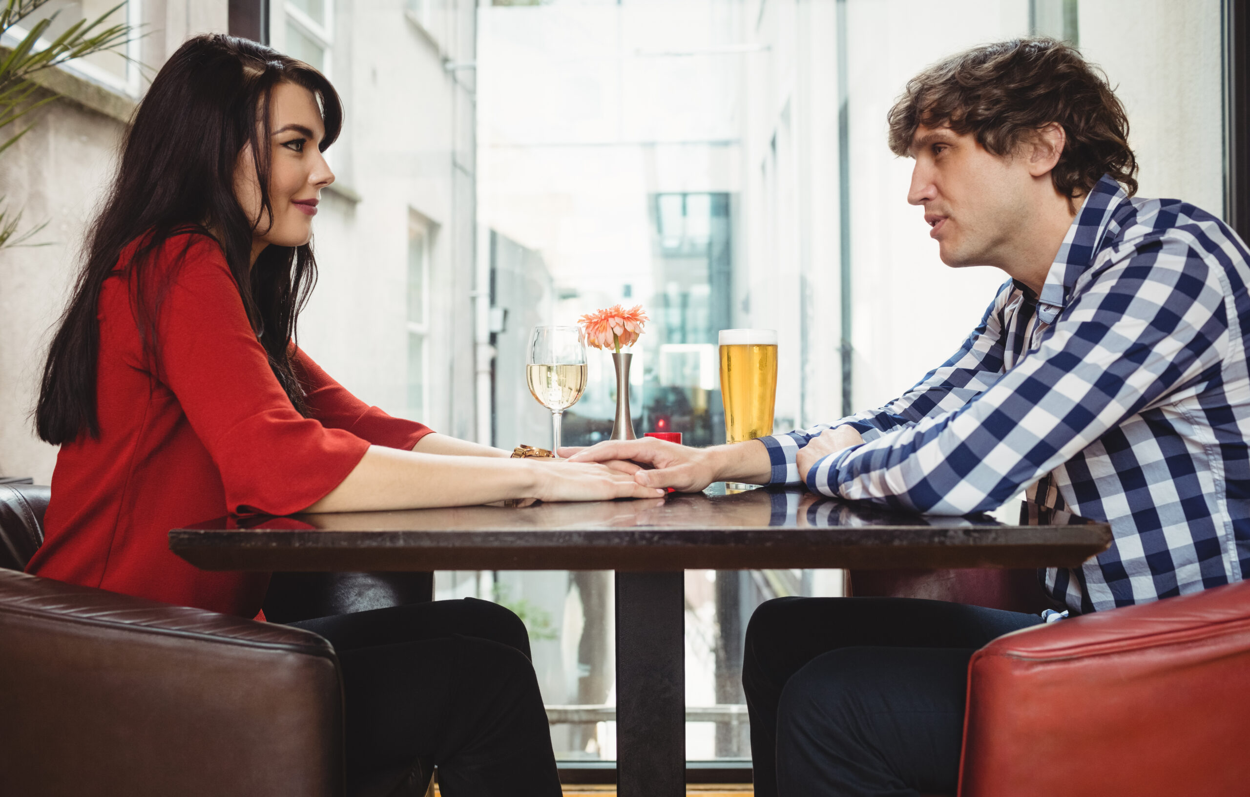 Couple having drinks together in bar Struggling with ADD or ADHD symptoms